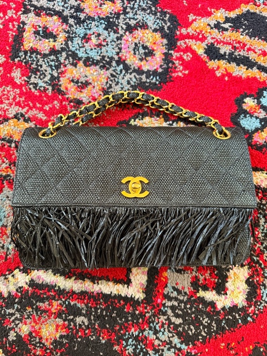 CHANEL Handbags - Chanel ultra rare 90s Quilted Fringe Black Raffia with 24k plated Gold Hardware